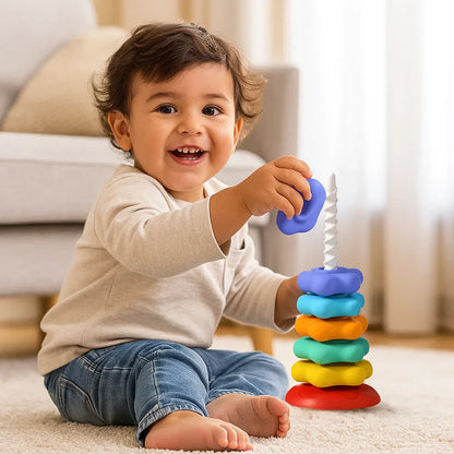 Juguete torre giratoria y de colores arcoíris