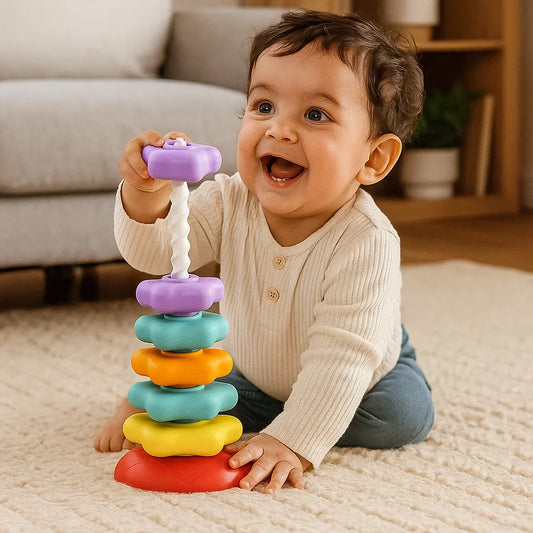 Juguete torre giratoria y de colores arcoíris